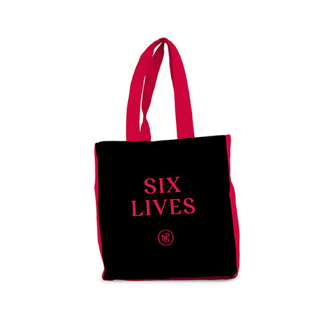 Reverse of tote bag featuring the title 'Six Lives' and NPG monogram in red against black with red handles.