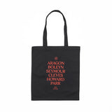 A black tote bag with the names 'Aragon, Boleyn, Seymour, Cleves, Howard, Parr' listed in red text.