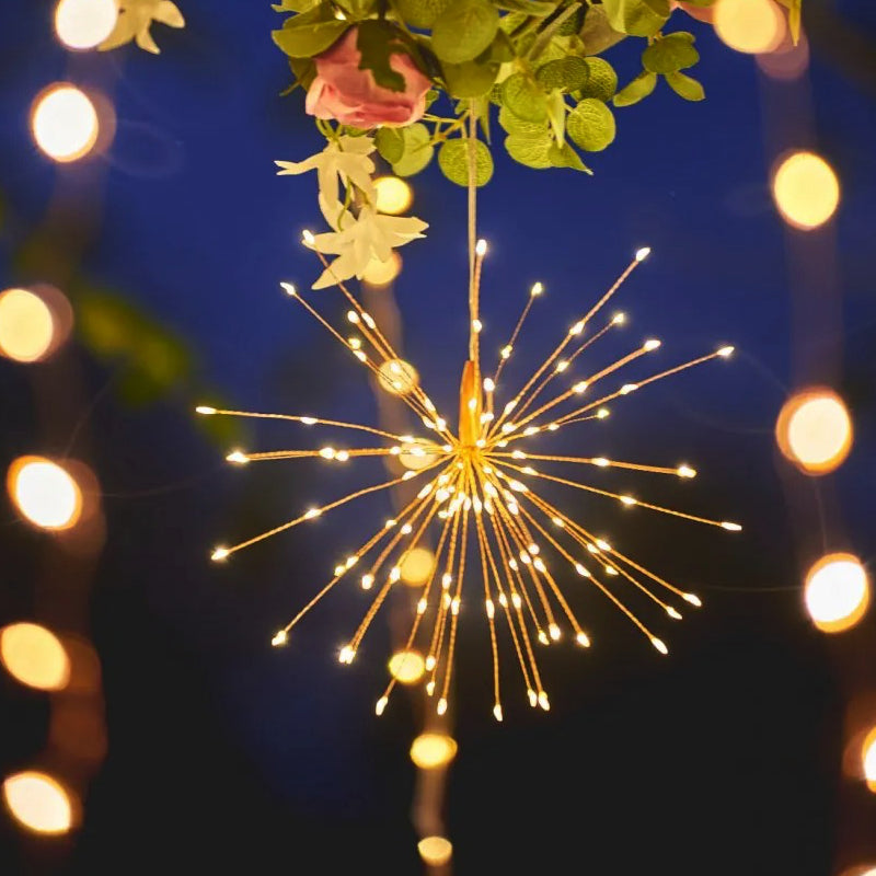 An image of a hanging starburst light in use outside