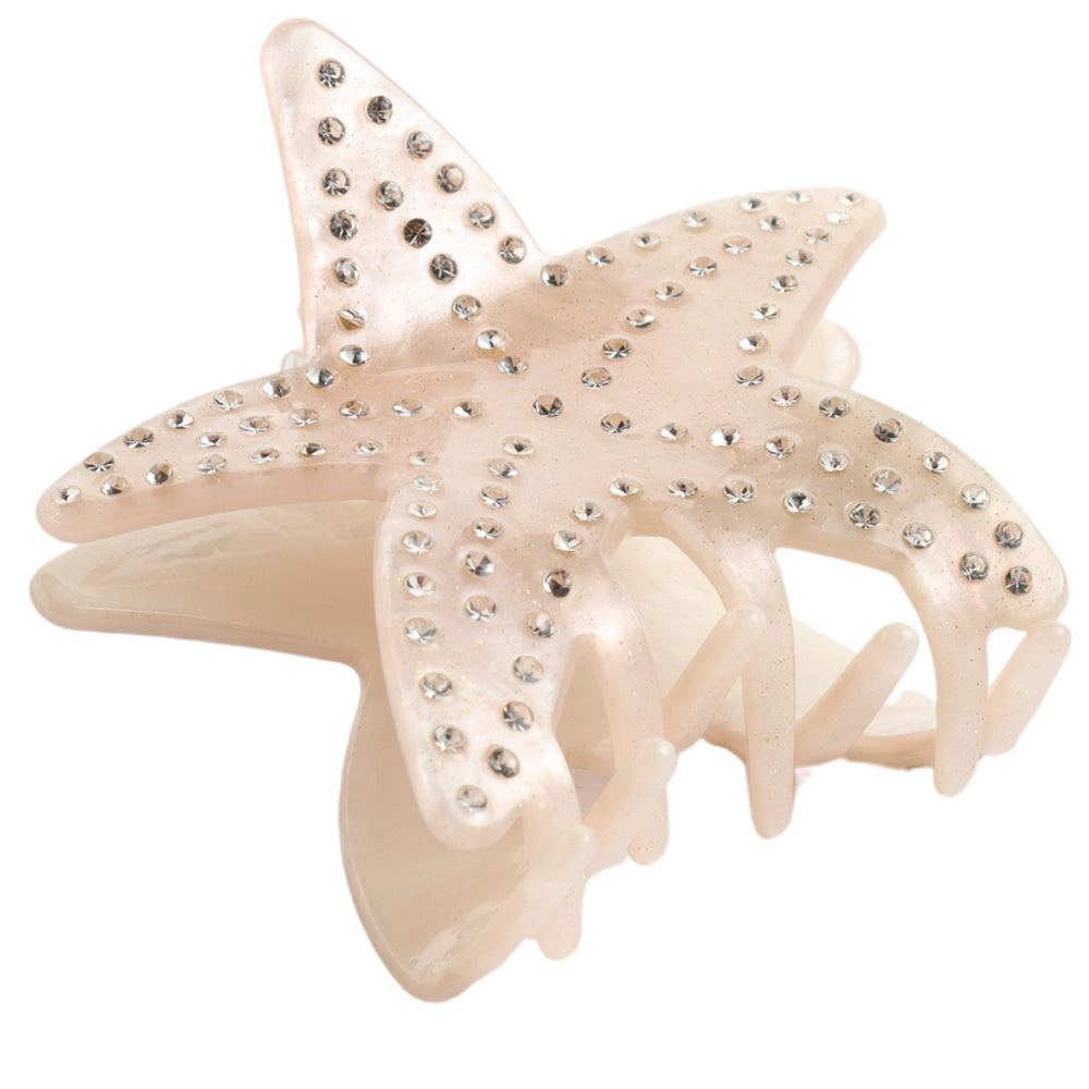 Starfish shaped hair claw clip with silver crystal embellishments against a white background 