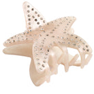 Starfish shaped hair claw clip with silver crystal embellishments against a white background 