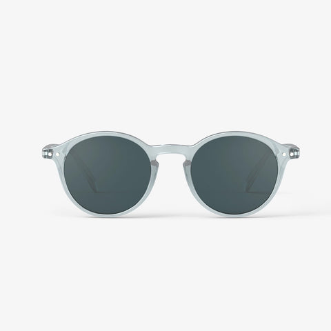 A pair of sunglasses with a light blue transparent frame.