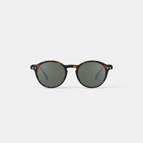 A pair of round sunglasses in a tortoiseshell frame.