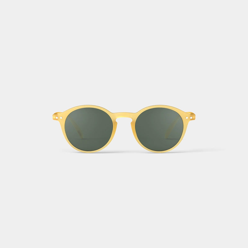 A pair of round sunglasses in a yellow honey frame.