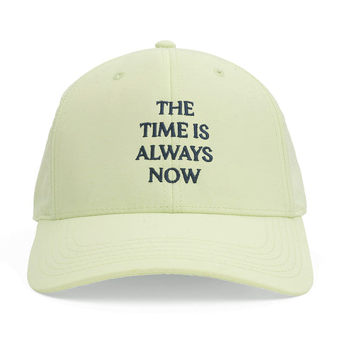 Mint green baseball cap with The Time is Always Now embroidered in navy blue on the front.