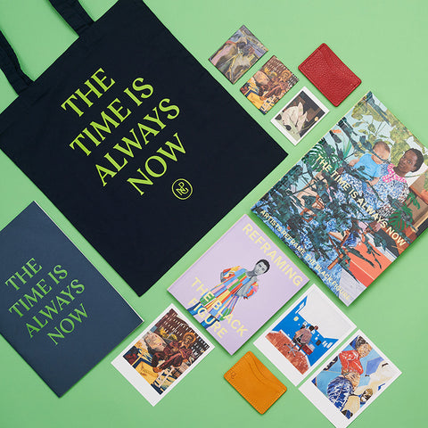 Collection of "The Time is Always Now" exhibition objects including the tote bag.