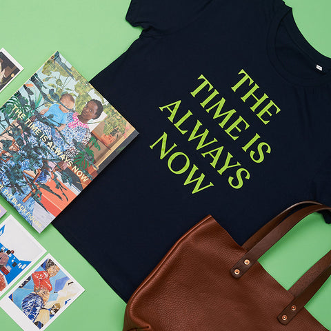 Collection of objects in "The Time Is Always Now" exhibition including the t-shirt.
