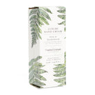 Box of luxury hand cream with fern design on a white background