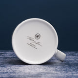 Bottom of white ceramic mug with Tracey Emin signature and NPG logo.