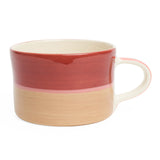 Three toned mug in red, beige and pink.