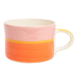 Three toned mug in pink, yellow and orange.