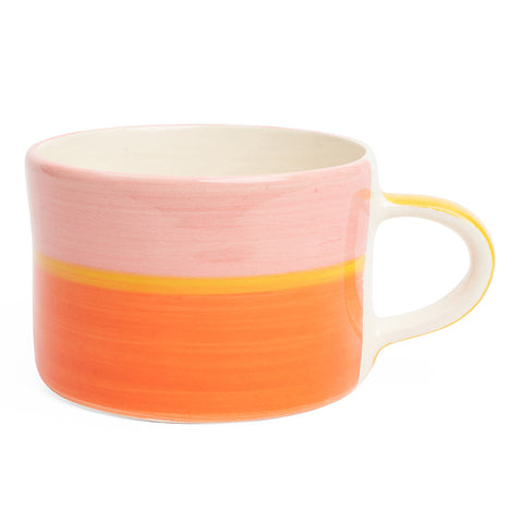 Three toned mug in pink, yellow and orange.