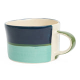 Three toned mug in dark blue, green and light blue. 