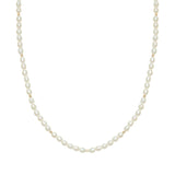 Pearl necklace with gold beads.
