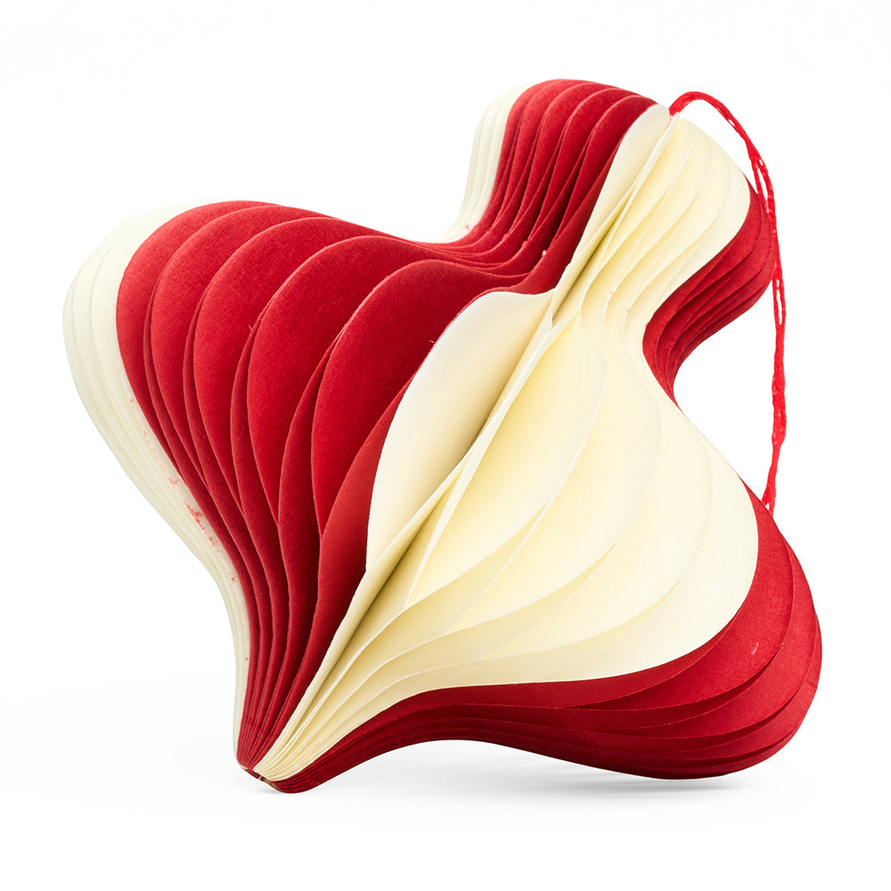 Red and cream striped honeycomb paper christmas decoration.