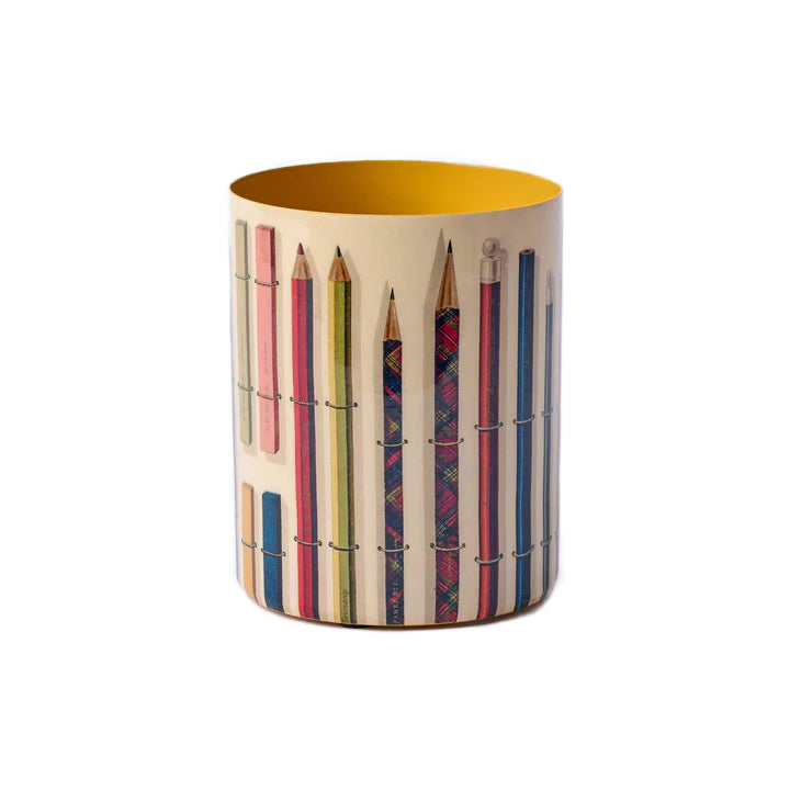 Pencil holder with colorful pencil design on a white background