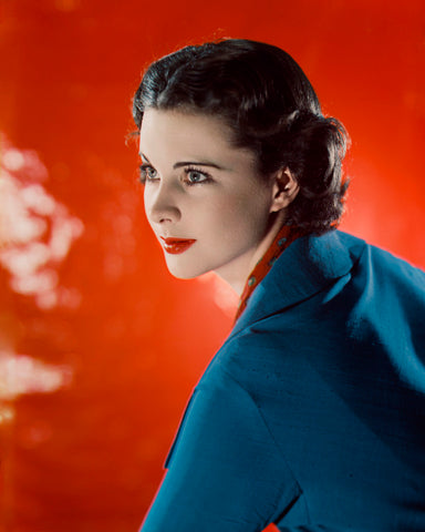 Limited edition print of Vivien Leigh dressed in blue against a bright red background.