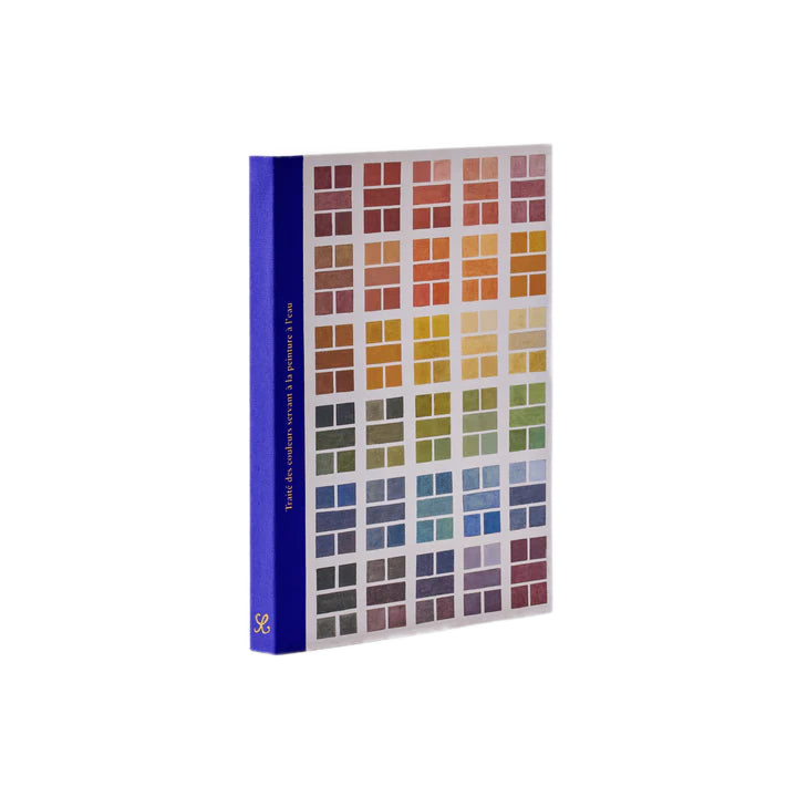 Colour swatch design book with grids of colour and a blue spine on a white background