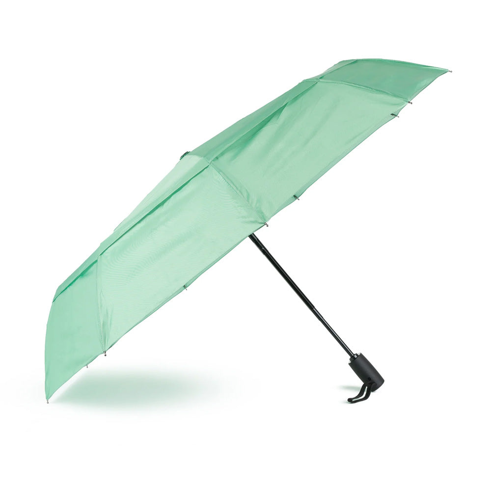 A mint green folding umbrella with a black handle and shaft, shown open against a plain white background.