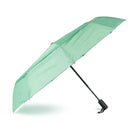 A mint green folding umbrella with a black handle and shaft, shown open against a plain white background.