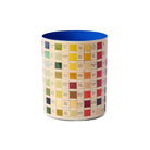 Colour swatch pen pot with a blue interior on a white background