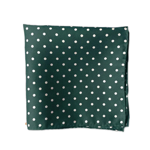 A dark green pocket square with white polka dots. 