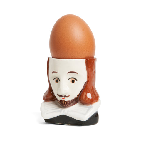 William Shakespeare ceramic egg cup with a boiled egg in it.