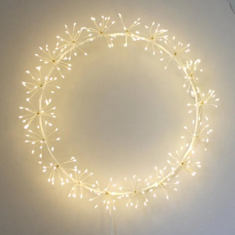 An image of the starburst wreath light on white