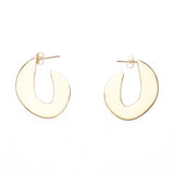 A pair of rounded hook shaped stud earrings in gold.