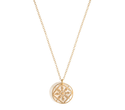 Gold vermeil lace design pendant with a pearl disc pendant behind, on a gold chain