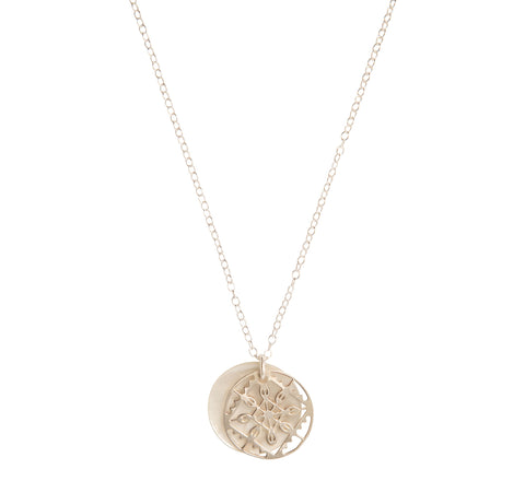 Sterling silver lace design pendant with a pearl disc pendant behind, on a silver chain