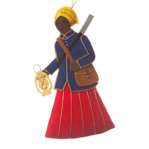 Handmade fabric sewn decoration featuring Harriet Tubman in a red dress, blue coat, holding a lantern. 