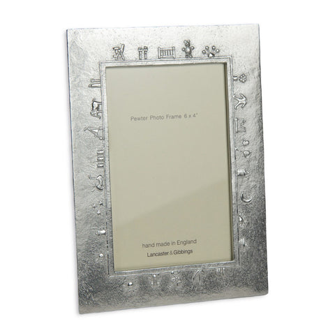 Pewter silver metal photo frame with baby charm detailing.