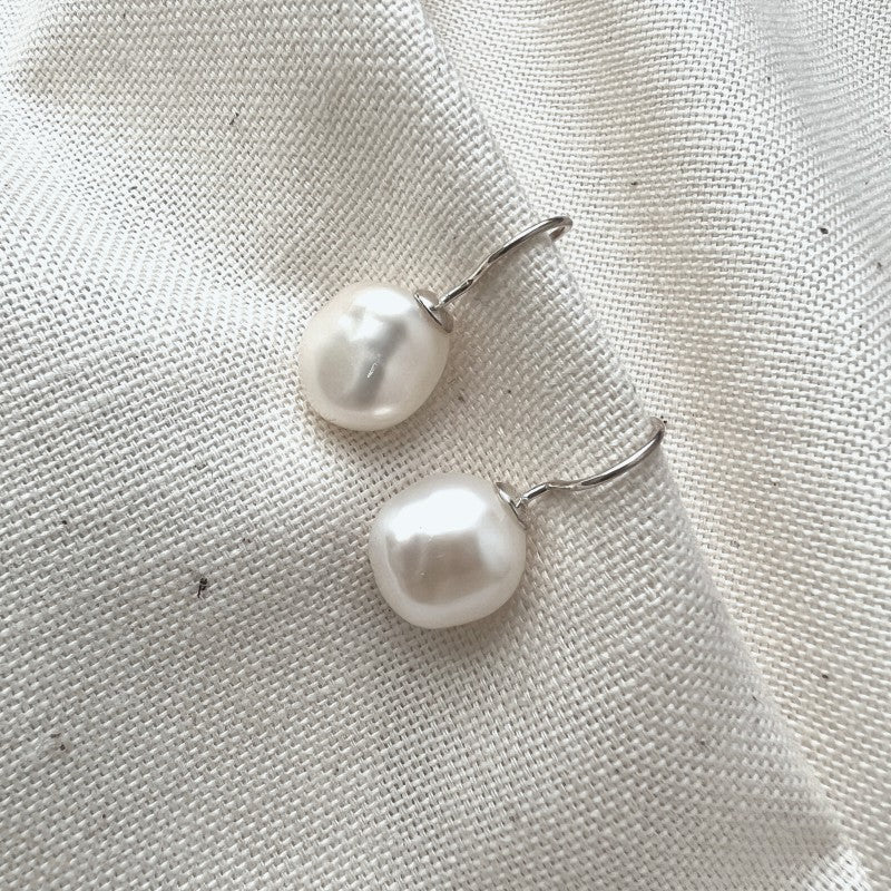 Baroque pearl drop earrings inspired by jewellery worn by Queen Elizabeth II for her Platinum Jubilee collection at the National Portrait Gallery