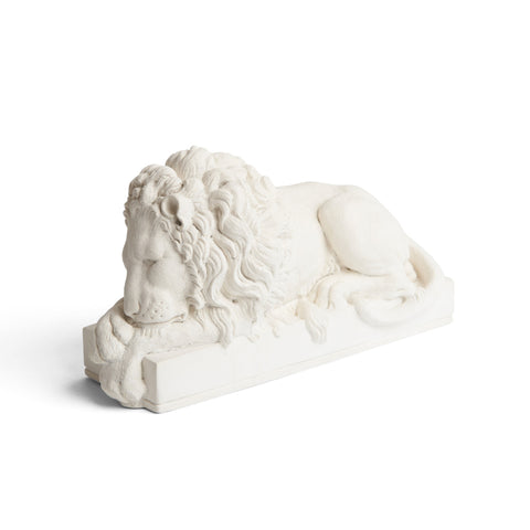 Canova sleeping lion plaster paperweight front view.