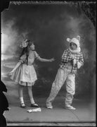 Estelle Dudley as Alice in 'Alice in Wonderland', with boy actor as the White Rabbit NPG x34662