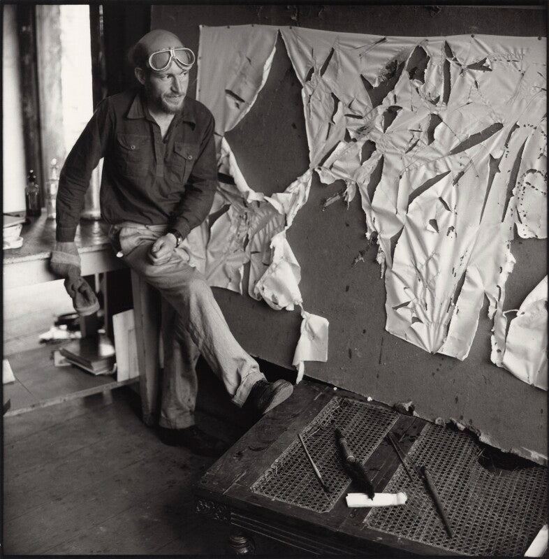 Gustav metzger practicing for a public demonstration of auto destructive art using acid on nylon npg x134797