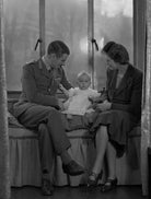 (Una Sheila) Colleen Nye (née Knox) and Sir Archibald Edward Nye with their daughter, Harriet Mary Sheila Newton-Clare (née Nye) NPG x73192