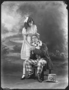 Phyllis Griffiths as Alice; Charles Hayden Coffin as The Mad Hatter in 'Alice in Wonderland' at the Garrick Theatre NPG x121240
