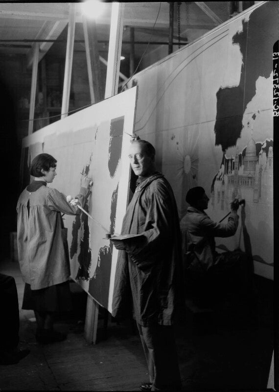 Macdonald gill with two assistants working on 'decorative map of the atlantic' for rms queen mary npg x14553