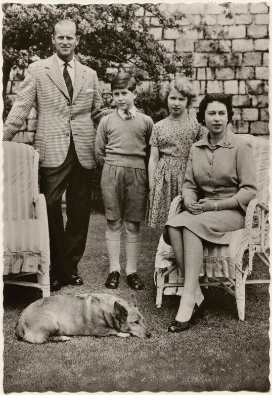 'h.m. the queen with her family in windsor castle gardens' (prince philip, duke of edinburgh; prince charles; princess anne; queen elizabeth ii) npg x193035