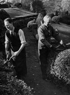 Frank Salisbury with his gardener NPG Ax76072
