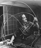 Barbara Hepworth at work on the armature of a sculpture NPG x88517