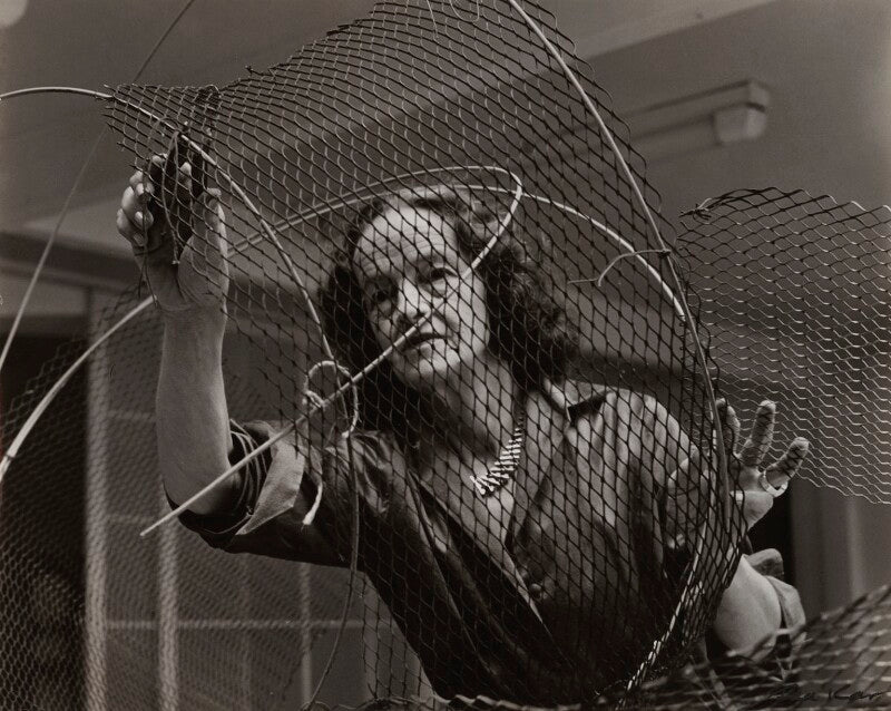 Barbara hepworth at work on the armature of a sculpture npg x88513