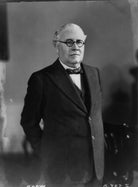 Sir (Howard) Kingsley Wood NPG x8388