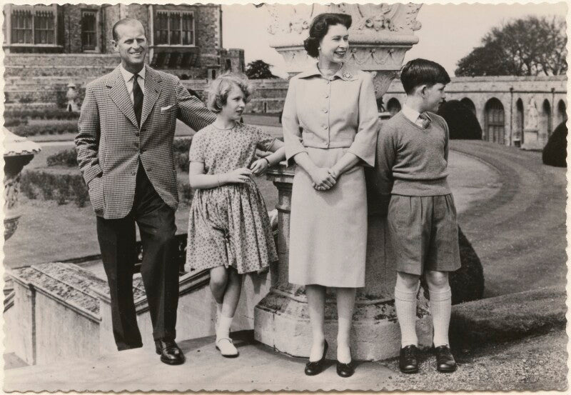 'h.m. the queen with her family in the east terrace garden, windsor castle' (prince philip, duke of edinburgh; princess anne; queen elizabeth ii; prince charles) npg x193034