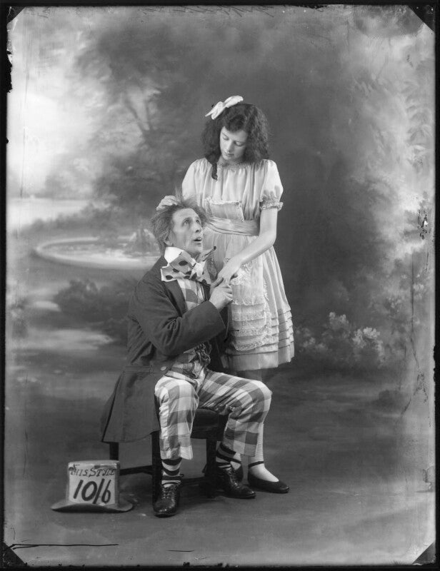 Charles hayden coffin as the mad hatter; phyllis griffiths as alice in 'alice in wonderland' at the garrick theatre npg x121241