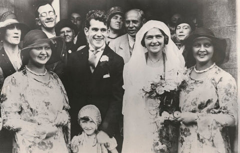 Mercedes Gleitze and Patrick Joseph Carey on their wedding day with adult bridesmaids 'Channel Twins’ Bernice and Phyllis Zittenfield NPG x198296