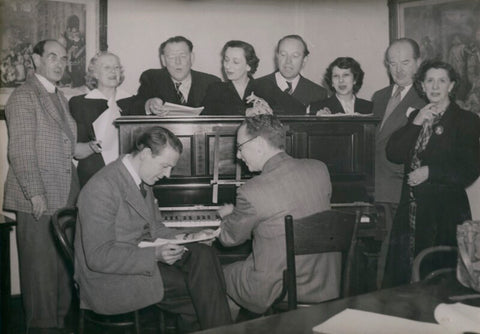 Diana Morrison, Clarence Wright, Ted Kavanagh, Dorothy Summers with members of the cast of 'It's That Man Again' NPG x184364