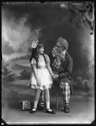 Estelle Dudley as Alice in 'Alice in Wonderland'; Charles Hayden Coffin as the Mad Hatter in 'Alice in Wonderland' NPG x34665